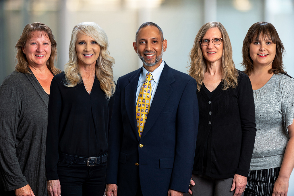 From left: Jodie (Medical Assistant), Kristy (Care Team Coordinator), Dr. Raheem Nazeer, Kris (Registered Nurse), and Maggy (Registered Nurse)