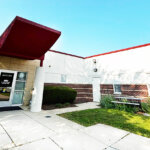 Elgin-Royal Imaging Entrance (two white columns with dark red awning)