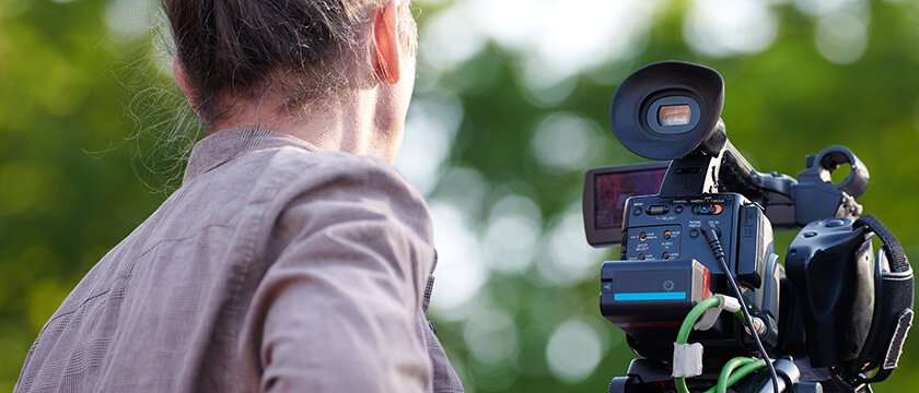 Woman Using Video Camera