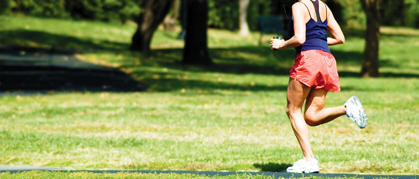 Woman Running on a Path