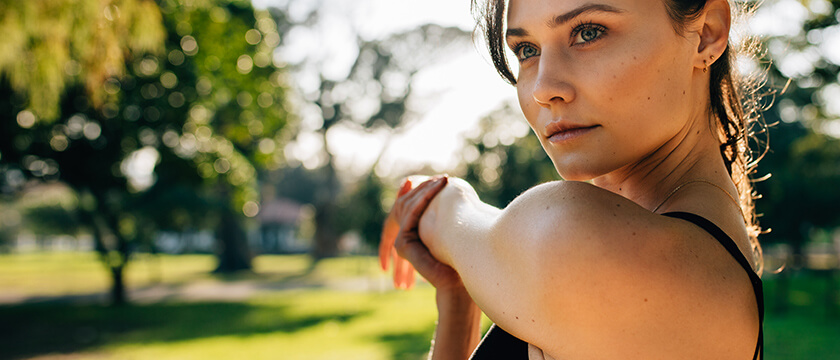Woman Stretching Her Shoulder