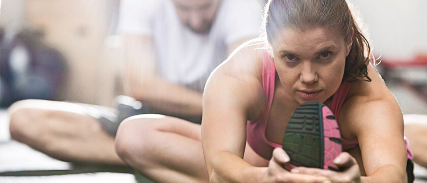 Determined Woman Stretching