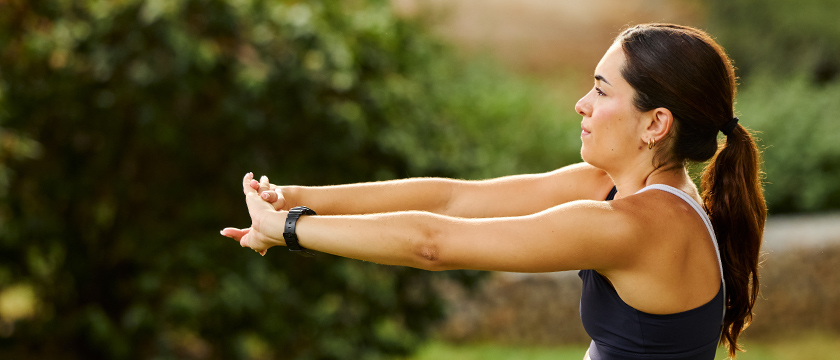 Woman Stretching Her Shoulder