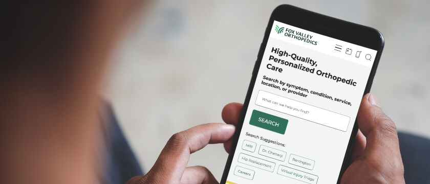 A mobile device showing the Fox Valley Orthopedics home page
