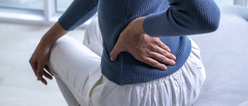 Hip Pain: Woman Holding Lower back/hip