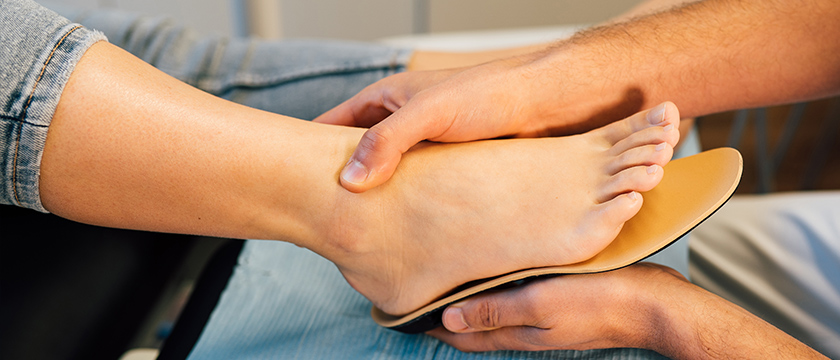 An Orthotic Being Fitted to a Foot