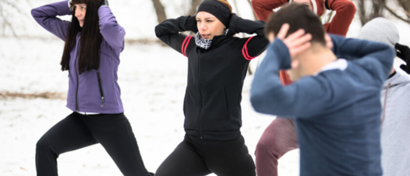 Group Stretching in Snow